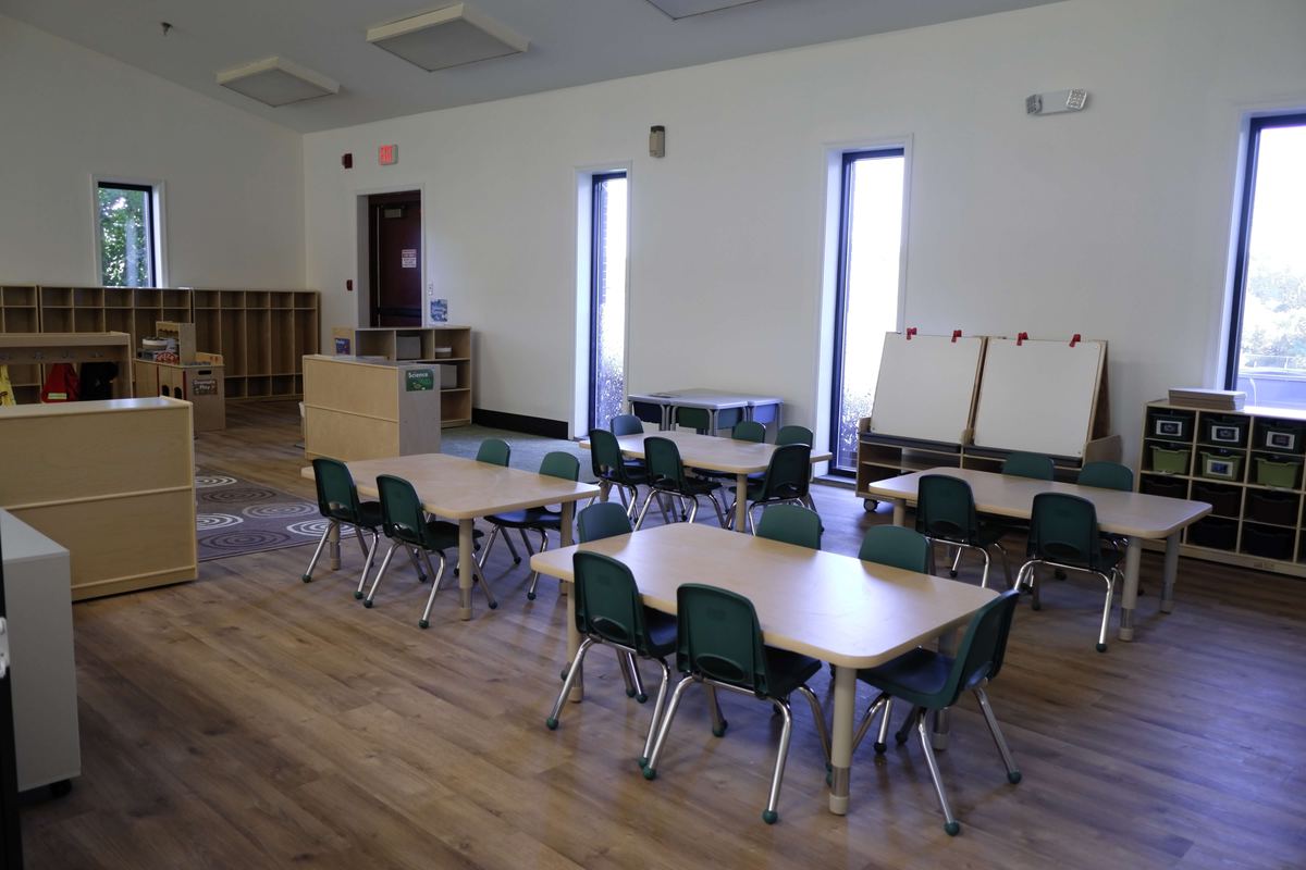 Tables and chairs in the 3s Room preschool classroom at Newark Nature School, Newark, DE
